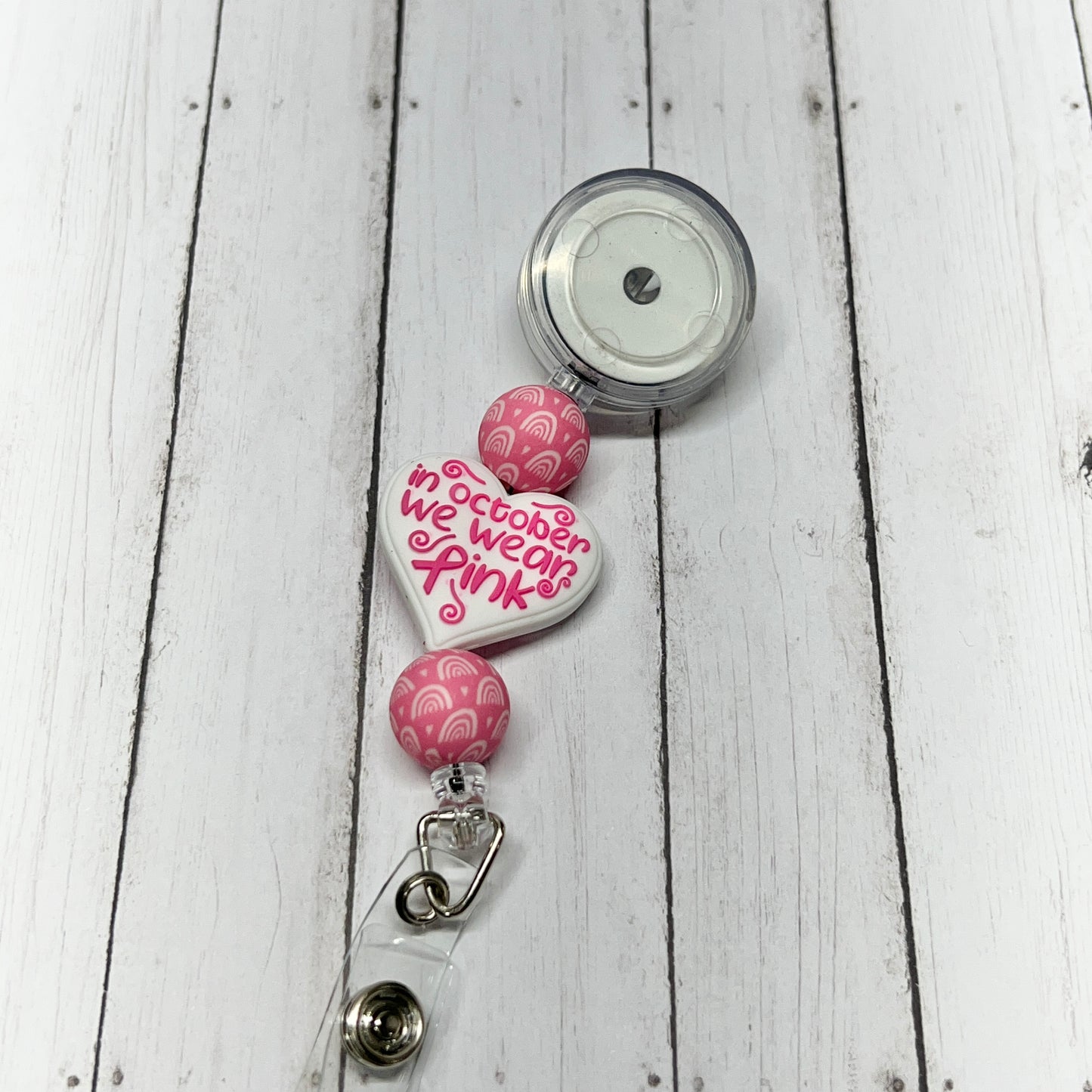 White October We Wear Pink Badge Reel