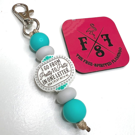 Pretty To Petty Keychain