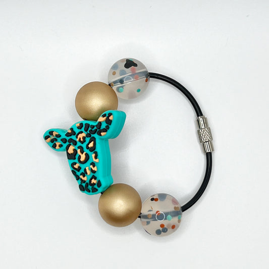 Turquoise Leopard Cow Cup Charm