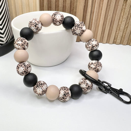 Matte Black Leopard Daisy Wristlet