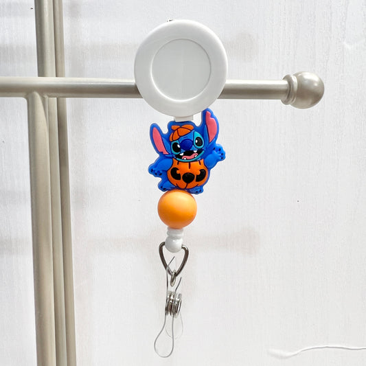 Pumpkin Blue Alien Badge Reel