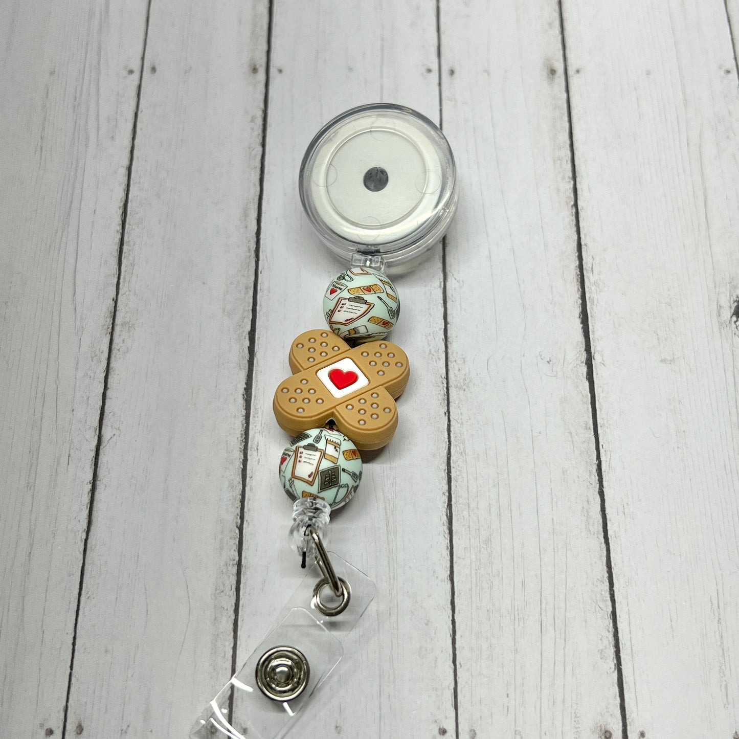 Band-Aid Heart Badge Reel