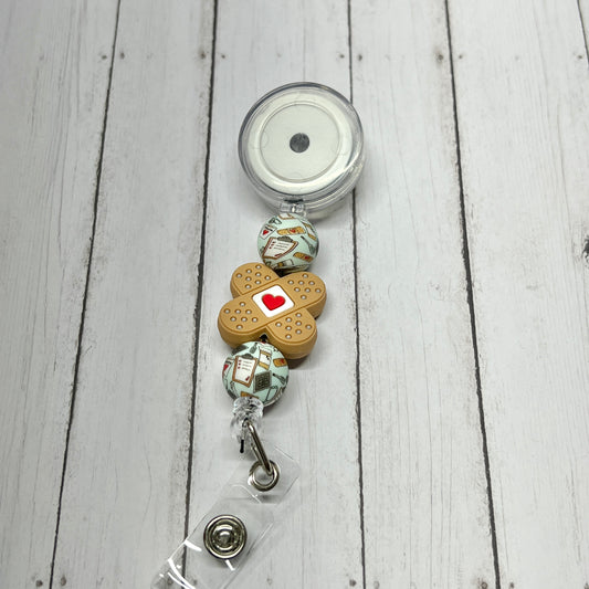 Band-Aid Heart Badge Reel