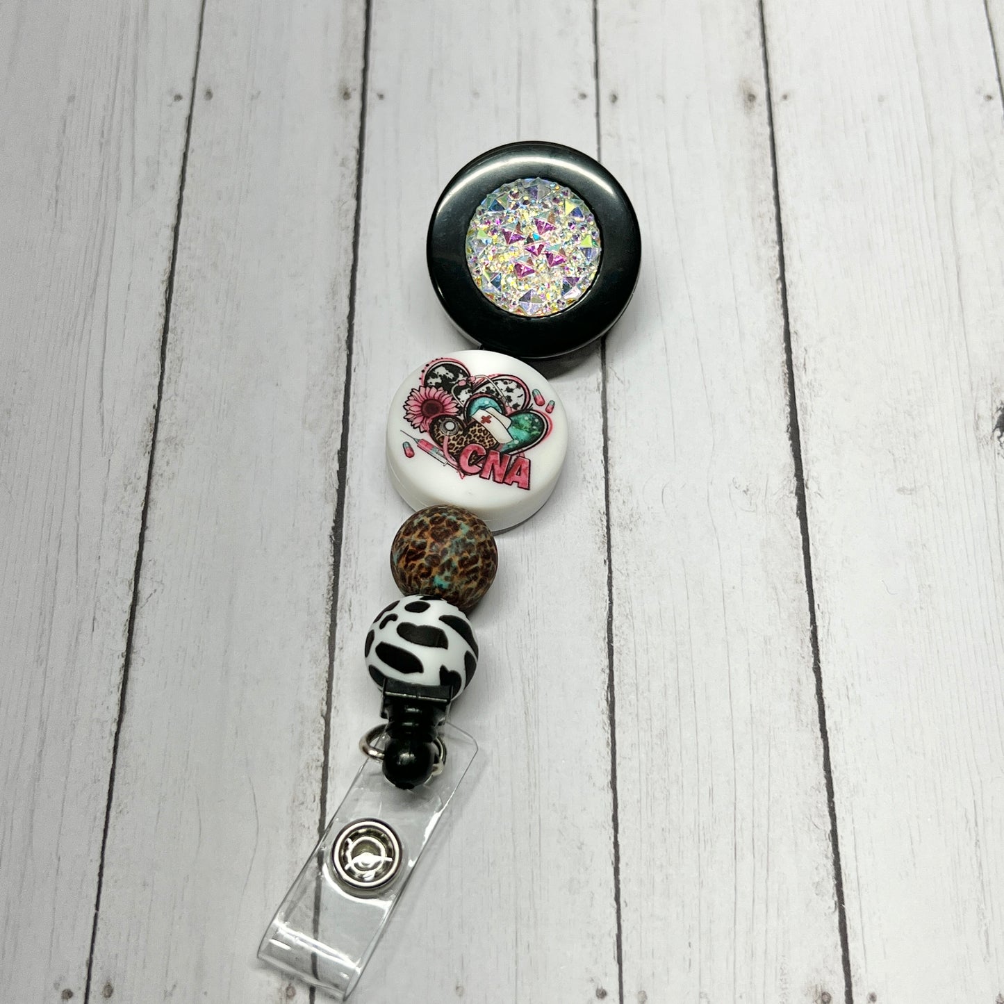 CNA Cow Leopard Badge Reel