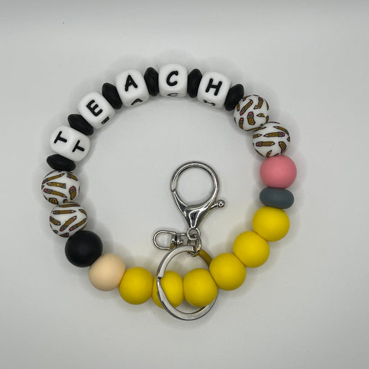 TEACH Pencil Wristlet